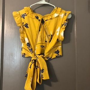 Cropped floral top with tie back.